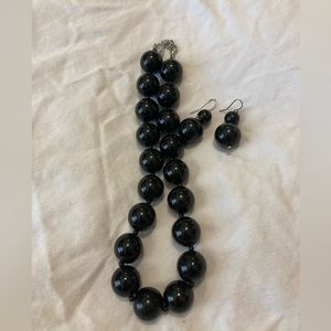 Women’s Boutique black necklace and matching earrings